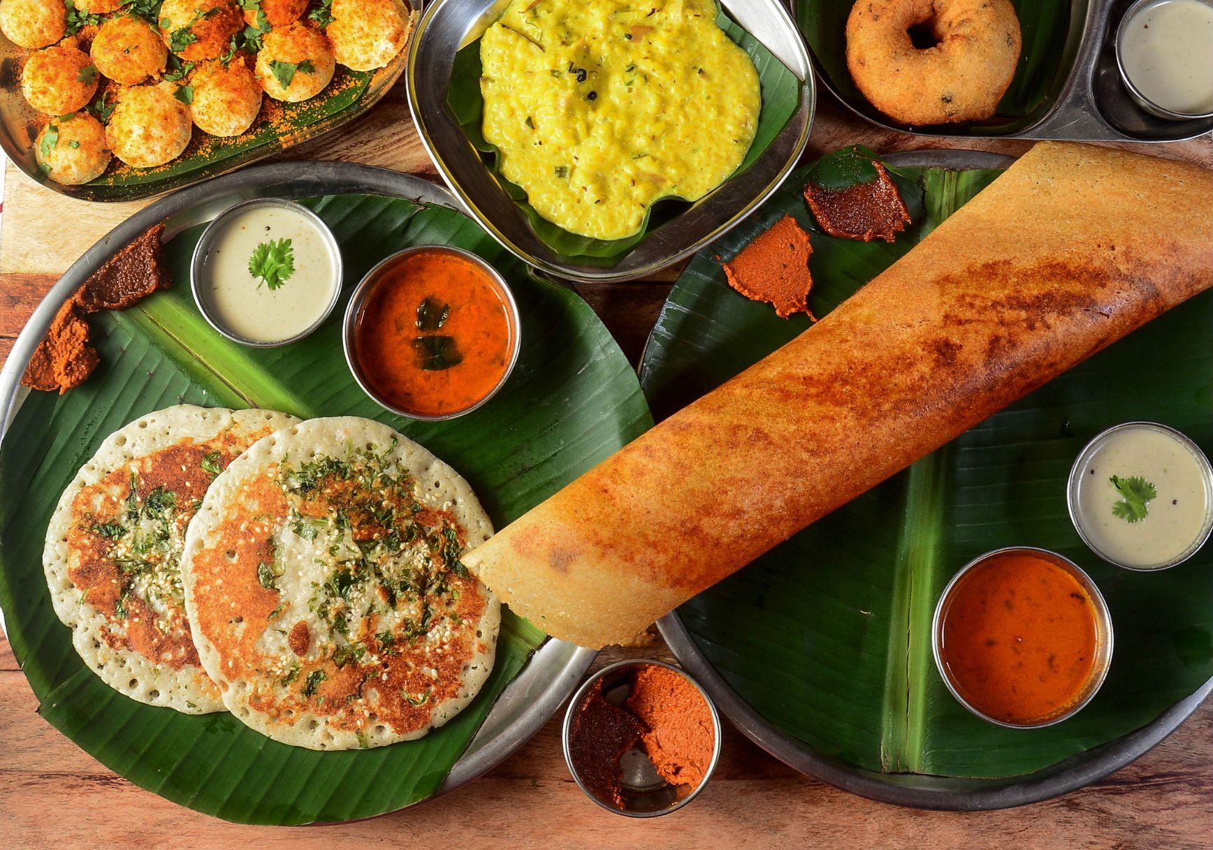 Traditional South Indian vegetarian meal served on banana leaves showcasing authentic cultural immersion